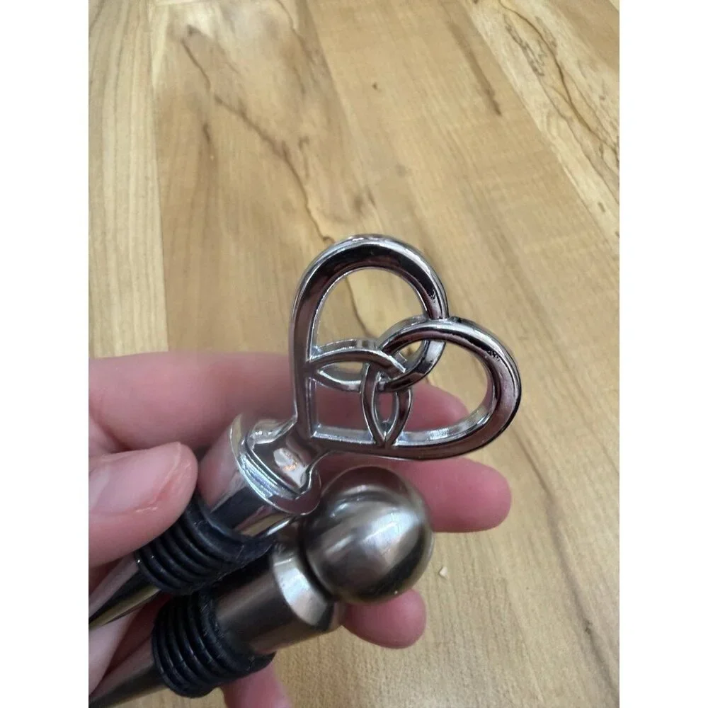 Two piece metal wine stoppers